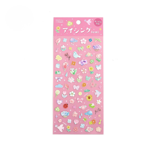 Decorative sticker sheet with various flower and springtime designs on a clear background